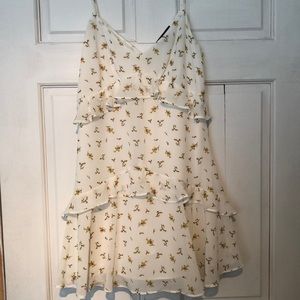 White short dress with yellow flowers
